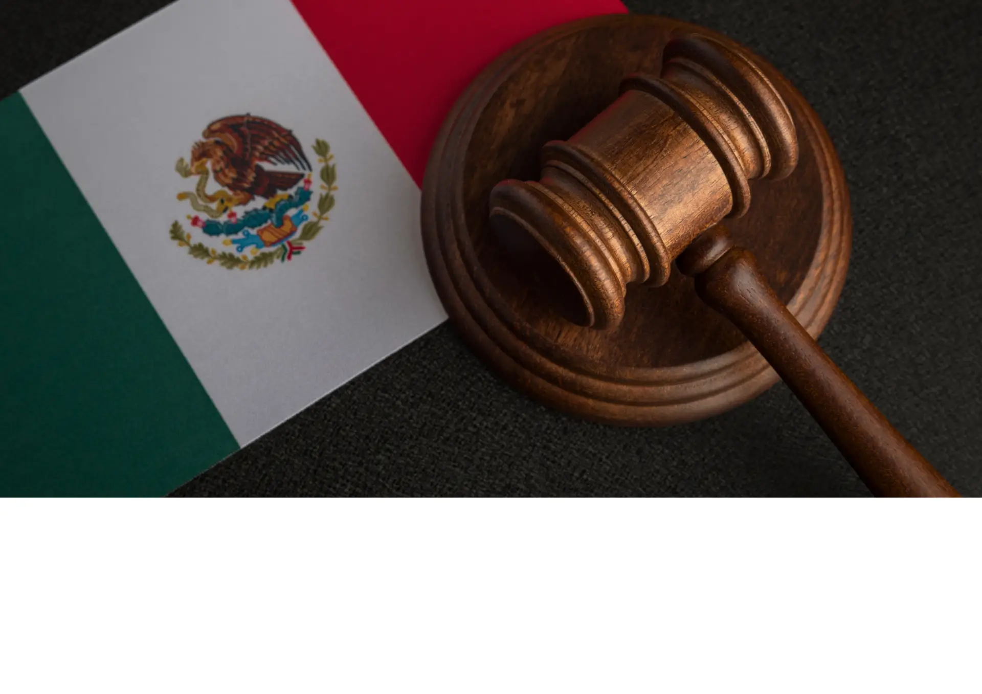 an illustration of mexican flag and gavel, representing laws
